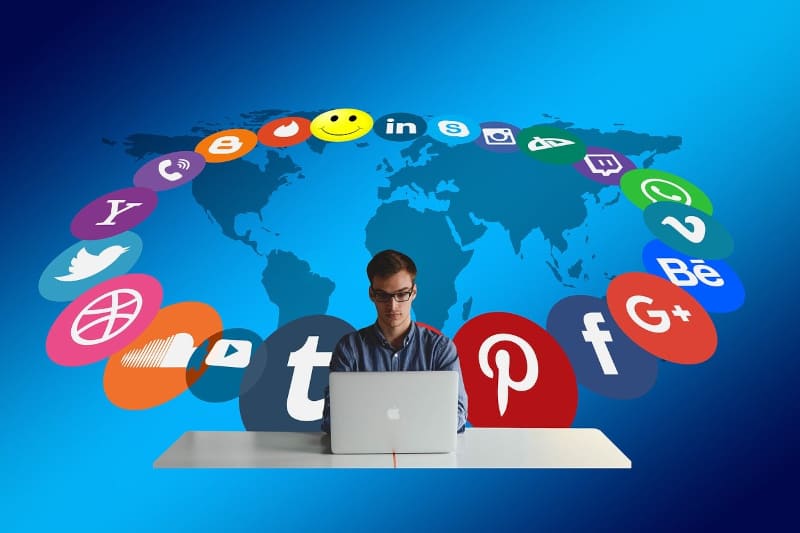 Blogging for fun not profit - social media icons in a circle with world map background